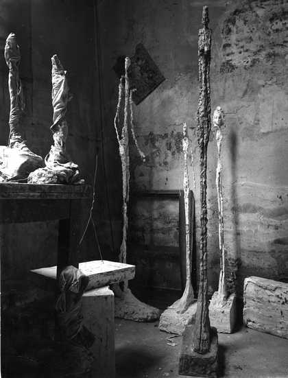 Standing Woman, 1948 and other sculptures in Giacometti's Paris studio, c. 1948-9, photographed by Ernst Scheidegger